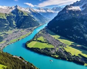 Ga paragliden boven de Alpen in Interlaken, Zwitserland